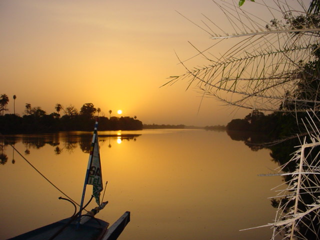 Golden sunset on The Gambia by Richard Sheard